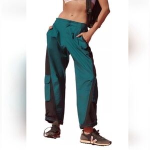 NWT Free People Movement Mesmerize Me Colorblock Pants Spruced Up Combo S